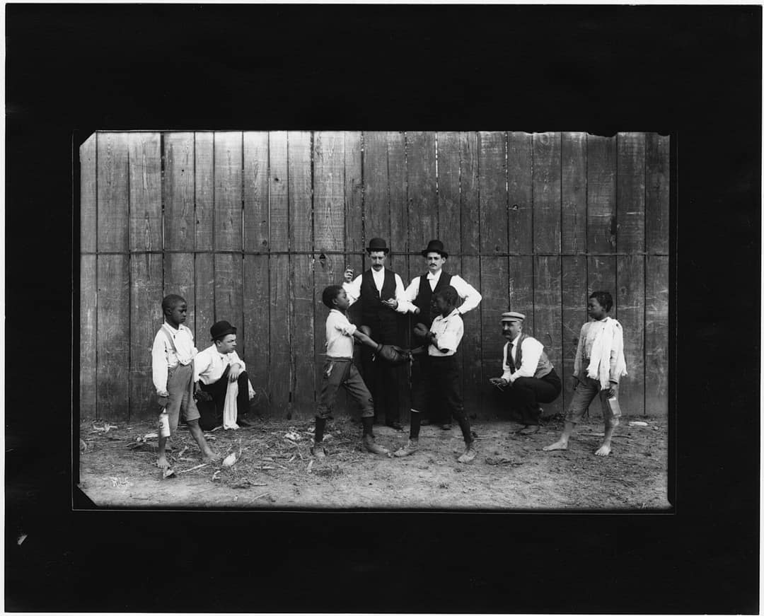 Boxers trading shots under ring lights